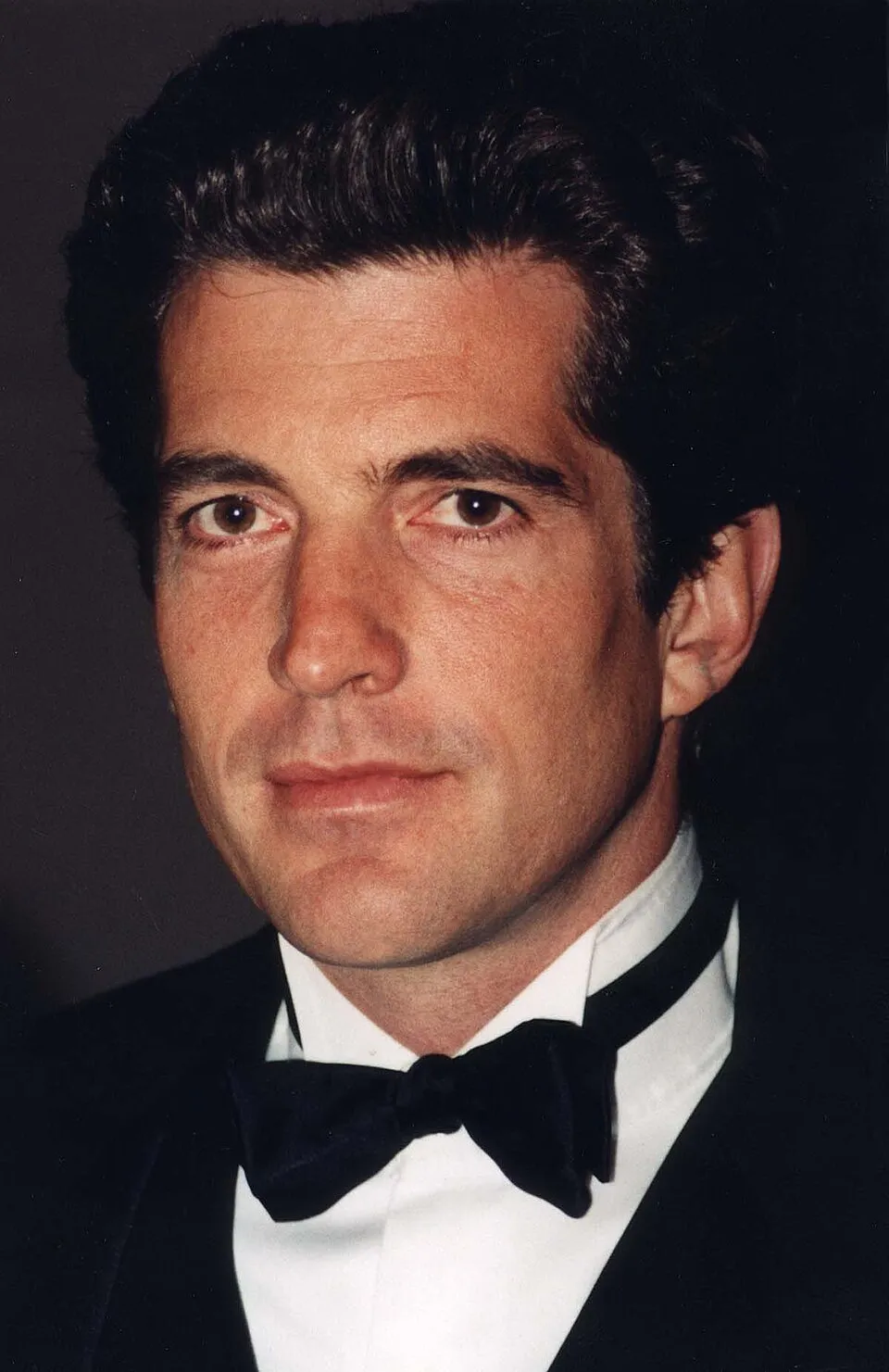 John F Kennedy Jr saat menghadiri acara publik di Manhattan