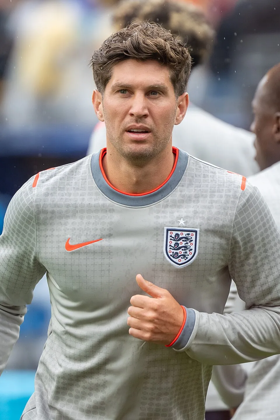 John Stones saat mengenakan jersey latihan Timnas Inggris di lapangan