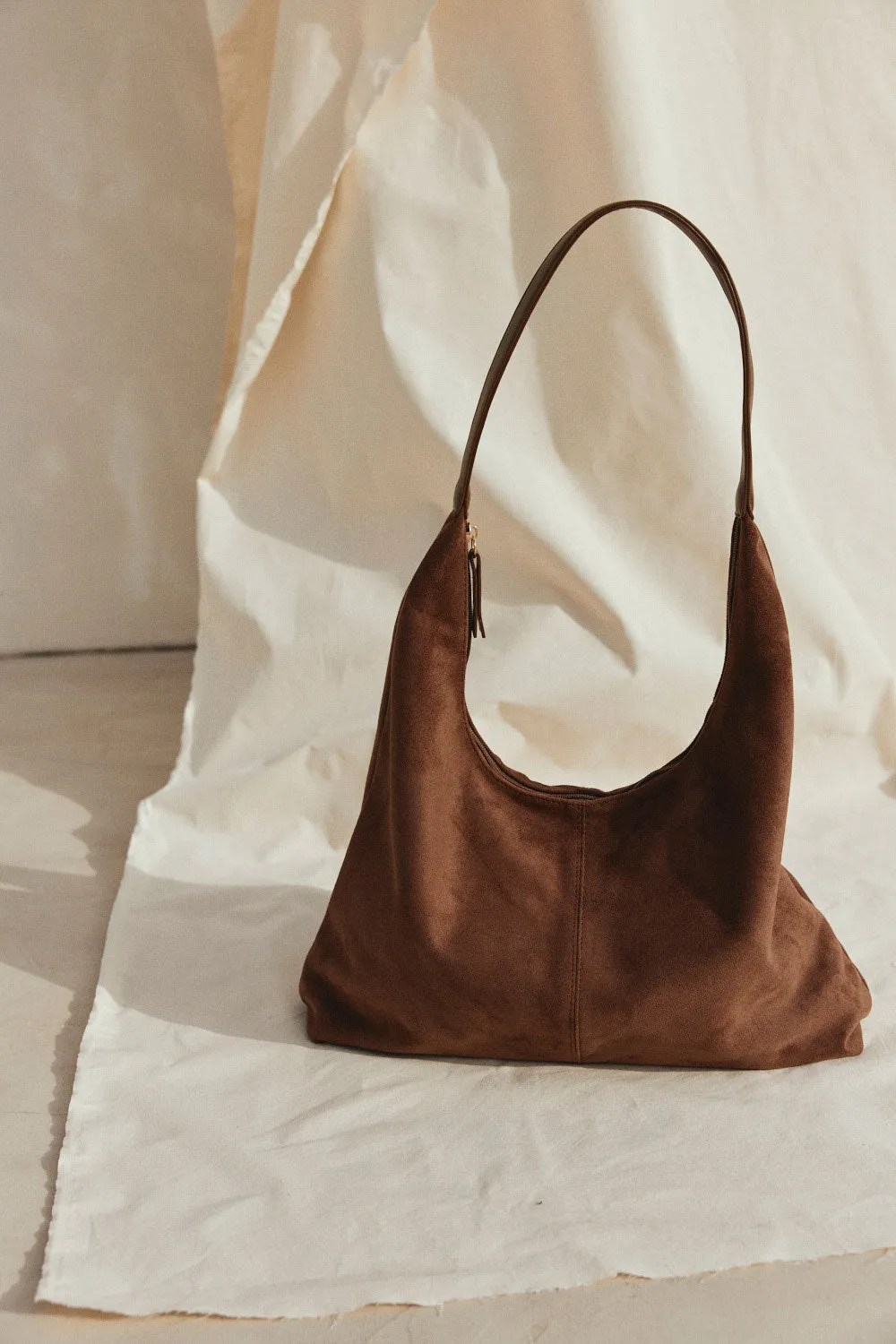 Roulette Bag Chocolate bahan suede lembut dengan tali panjang dari koleksi Joy368